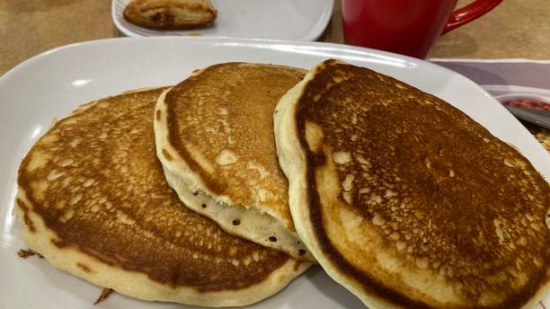 istock Pancakes with butter and honey 1534596884