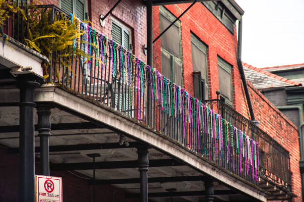 istock Mardi Gras Beads hanging from balcony 1534606901