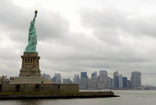 istock Statue of Liberty and NY Sky line 153466689