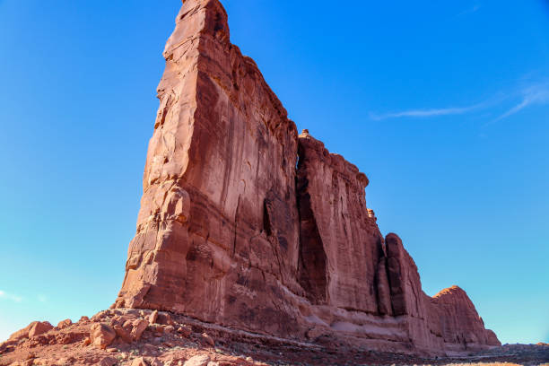 The monolithic sandstone monument known as the Tower of Babel is breathtaking in size this photo does not give the proper perspective of the enormous majestic red rock formation in the Arches National Park, Moab Utah.