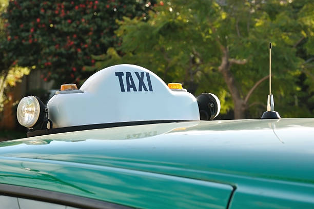 Taxi sign on roof of Melbourne \