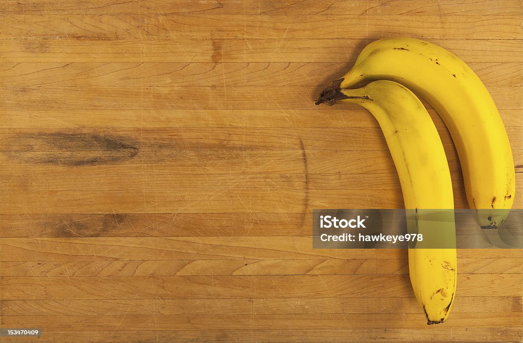 Bananen auf Butcher Block - Lizenzfrei Alt Stock-Foto