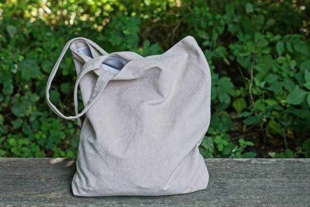 istock one large full gray bag stands on a wooden table on the street 1534737044