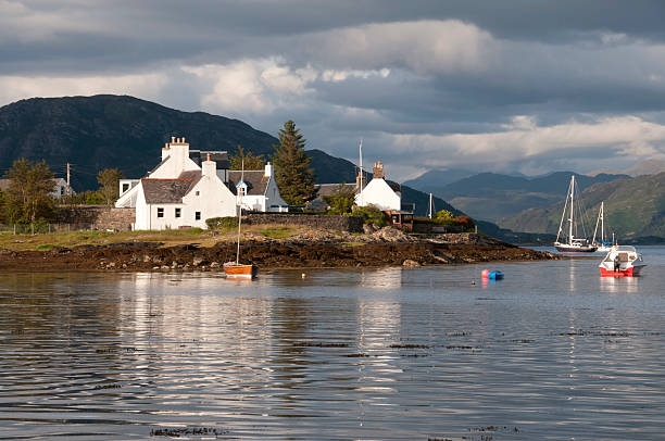 istock Sun on Plockton Houses 153475250