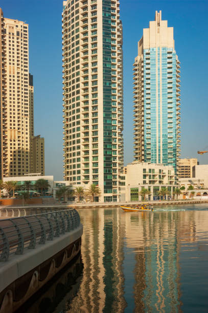istock High rise buildings and streets in Dubai, UAE 1534754324
