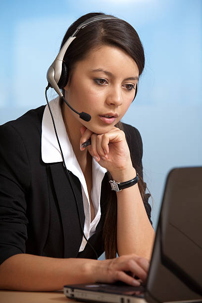 istock Beautiful business service woman looking at computer. 153476789