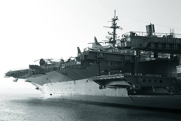 Aircraft carrier Aircraft carrier in the ocean us navy stock pictures, royalty-free photos & images
