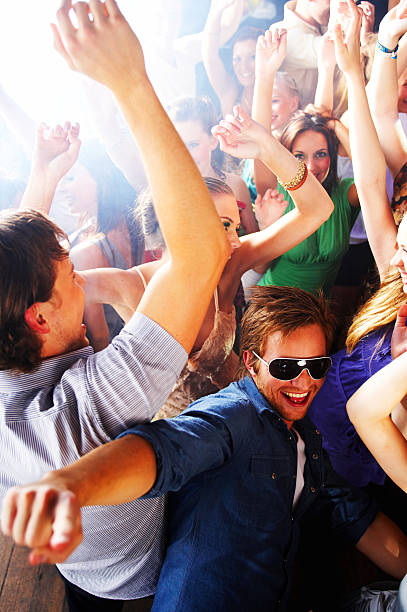 istock Group of young people dancing at a disco 153478029