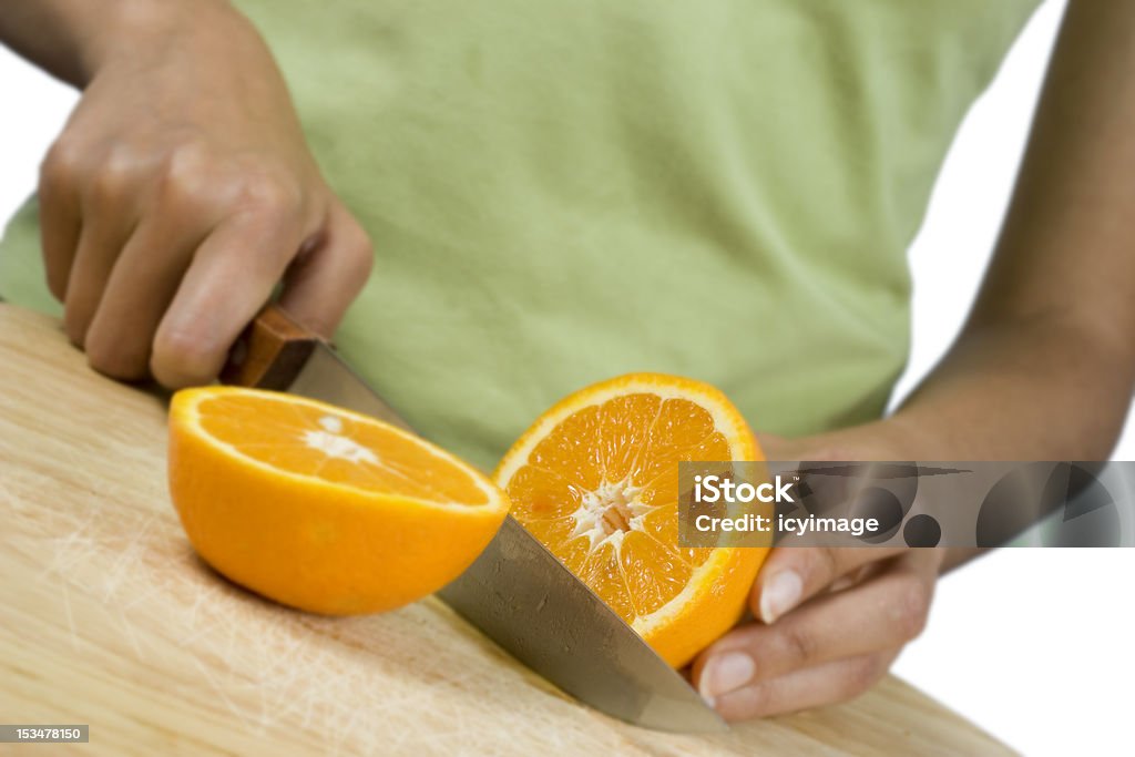 Ragazza taglio arancione - Foto stock royalty-free di Adulto