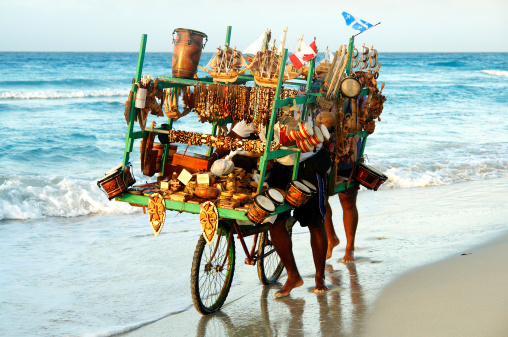 souvenir vendors on caribbean beach