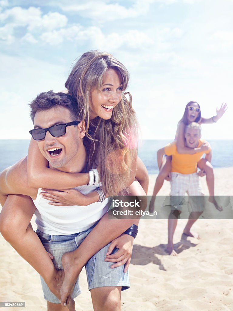 Diversión en la playa - Foto de stock de A caballo libre de derechos