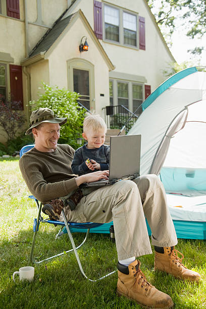 Father and son camping stock photo