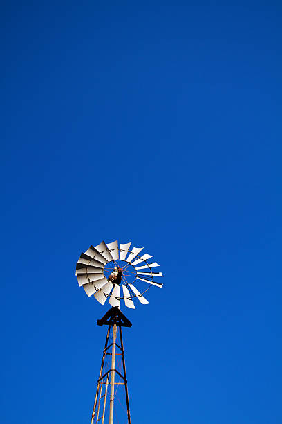 Windmill with blue sky plenty of room for text stock photo