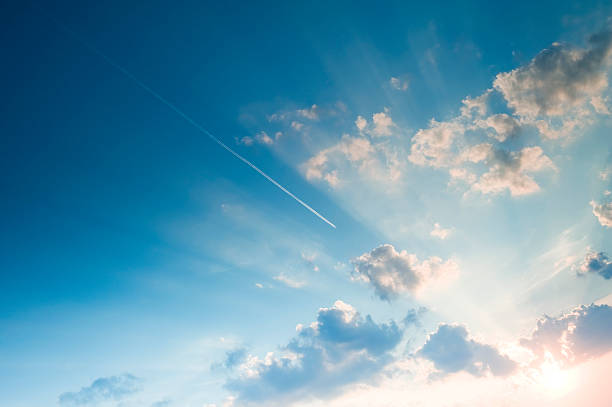 istock Airplane in sky at sunset 153481787