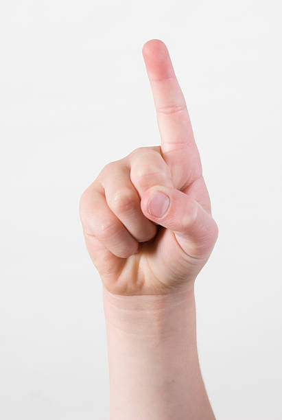 Finger Pointing One - hand sign stock photo