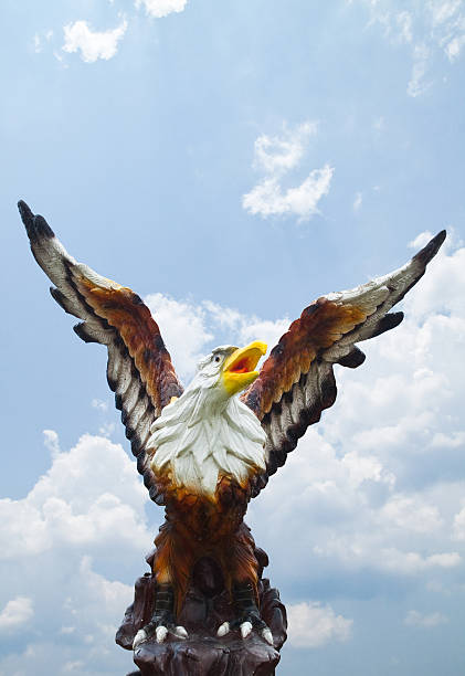istock Sculpture of eagle on blue sky background 153482083