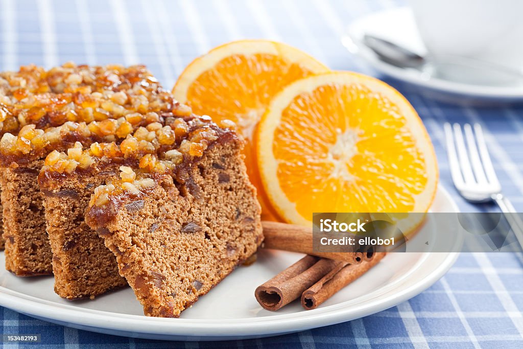 Gingerbread. Gingerbread with orange and cup of coffee or tea. Backgrounds Stock Photo
