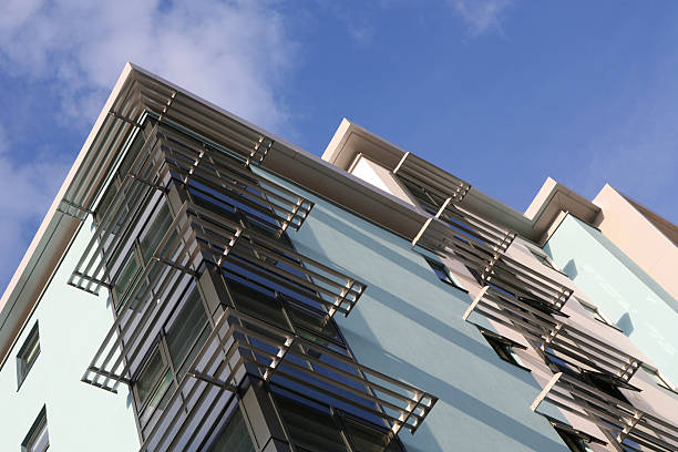 Solar Shading Detail of modern apartment block with aluminium solar louvres airfoil photos stock pictures, royalty-free photos & images
