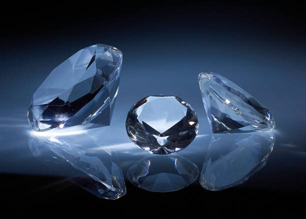 istock Shiny diamonds jewel on dark blue 153482467