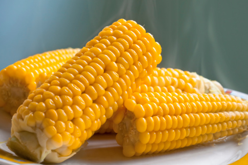 close up of sweet corn boiled with steam