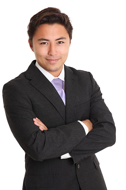 istock Young man in suit and tie looking smug 153483634