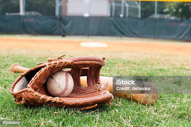 Old Baseball Glove And Bat On Field Stock Photo - Download Image Now - Baseball Glove, Baseball - Sport, Baseball - Ball