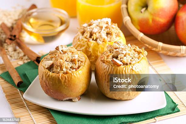 Baked Apple Stuffed With Bread Pudding Stock Photo - Download Image Now - Baked Apple, Blue, Cinnamon