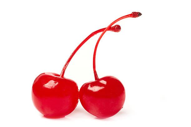 Maraschino cherries with stem Maraschino cherries with stem isolated on white background maraschino cherry stock pictures, royalty-free photos & images