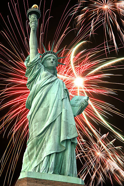istock Statue of Liberty and fireworks in black sky 153484313