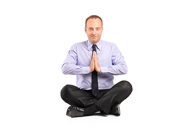 istock Man doing yoga exercise seated on a floor 153484341
