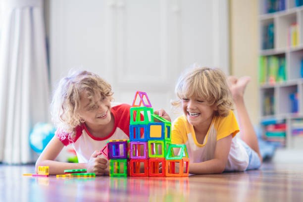 istock Child playing with magnetic building blocks. 1534846885