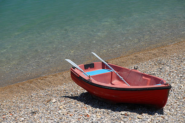 Cтоковое фото Красный Гребная лодка на пляже