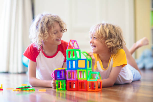 istock Child playing with magnetic building blocks. 1534856605