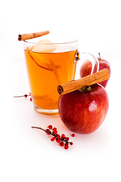 istock Apple cider and an apple set against a white background 153485869