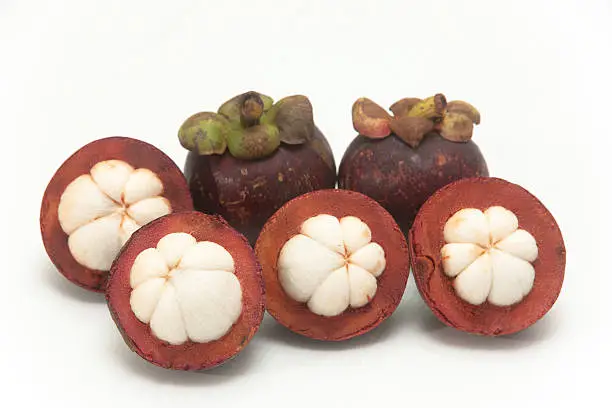 Mangosteen on white isolate.,it is one of Thai fruit and it is queen of fruit