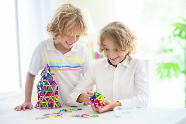 istock Child playing with magnetic building blocks. 1534861965