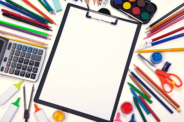 istock black clipboard with school supplies 153486541