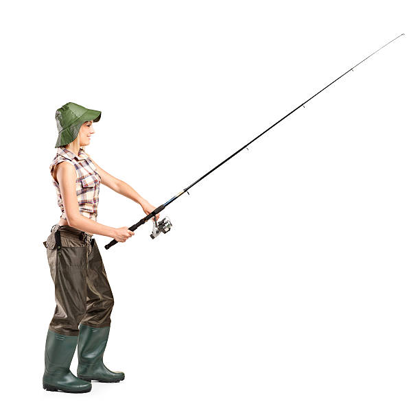 istock Young fisherwoman posing 153487049