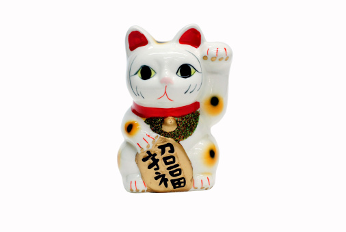 Japan's beckoing cat on white background