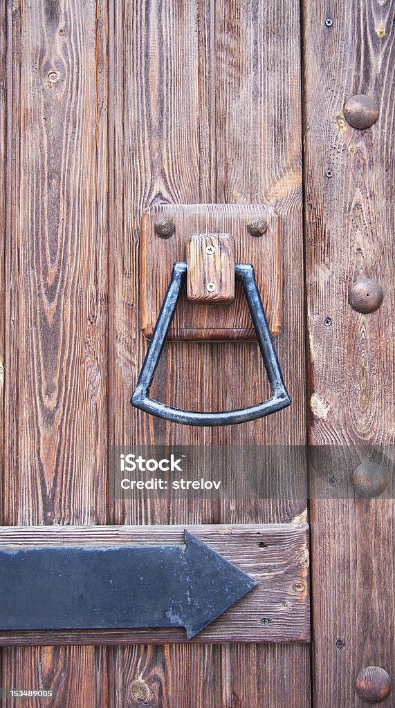 wooden door Old door knockers on an old door Chalkboard - Visual Aid Stock Photo