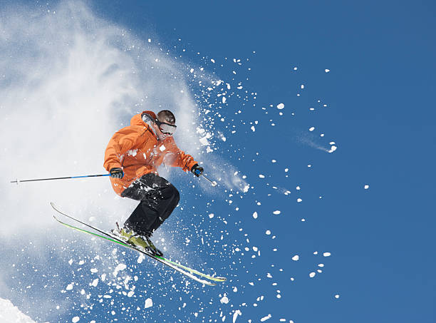 A ski jump on the edge of mountain  stock photo