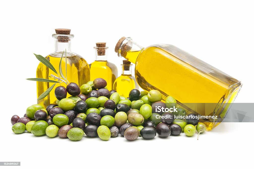 olives and olive oil ecological olives and olive oil on white background Cooking Oil Stock Photo