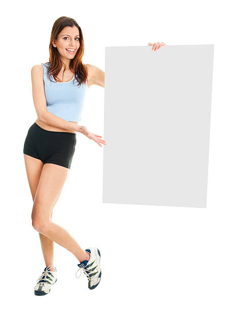 istock Fitness woman presenting empty placard 153489511