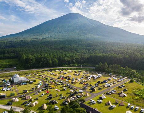 Campers flock to camp during the summer time at the base of Mt. Iwate in Iwate Prefecture, Japan.