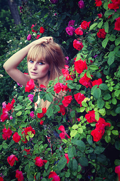 istock girl in roses 153490534