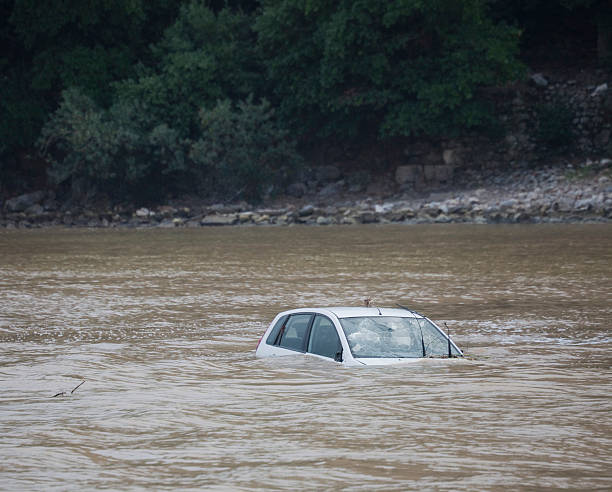 istock Damaged Car flooded in the Ocean 153490904