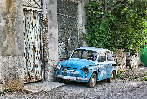 istock Old car abandoned on the street 153491221