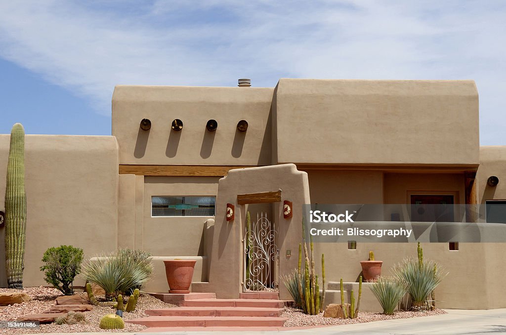 Southwest Adobe Home A close up of a nicely landscaped home of the southwest adobe style just outside of Las Vegas, Nevada near the Lake Mead resort. House Stock Photo