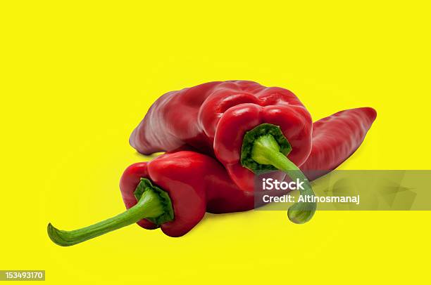 Red Sweet Paprika Long Peppers Yellow Bg Stock Photo - Download Image Now - Bell Pepper, Clipping Path, Close-up