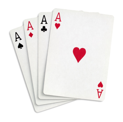 Four aces on white with clipping path